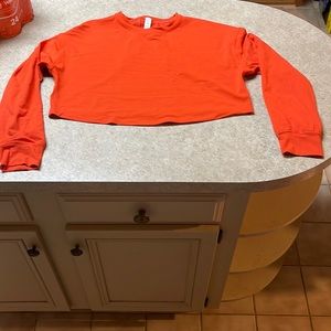 Lululemon Orange long sleeve crop top